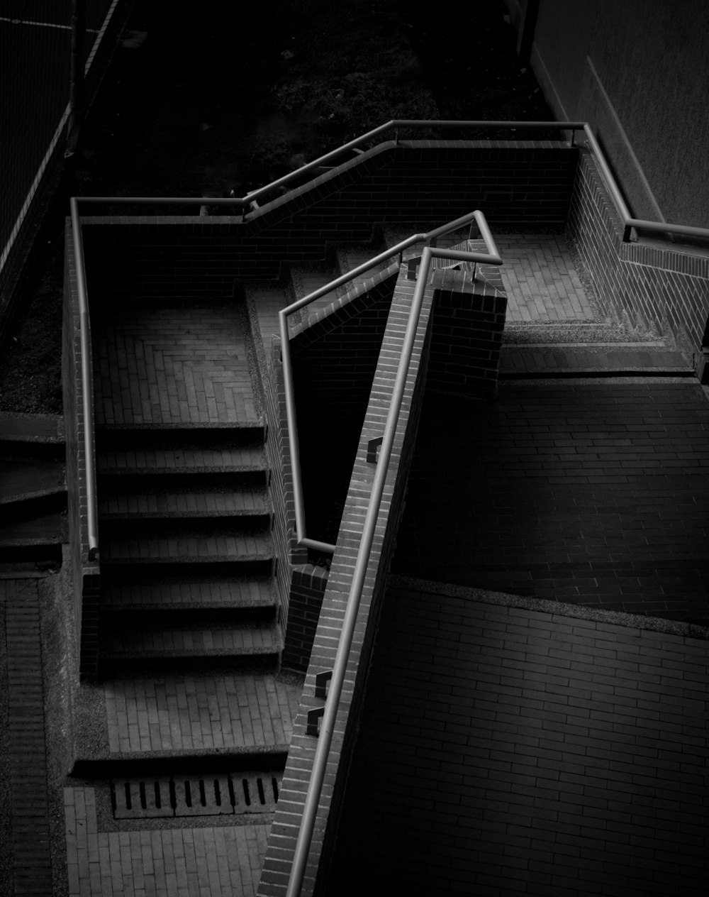 a black and white photo of a staircase