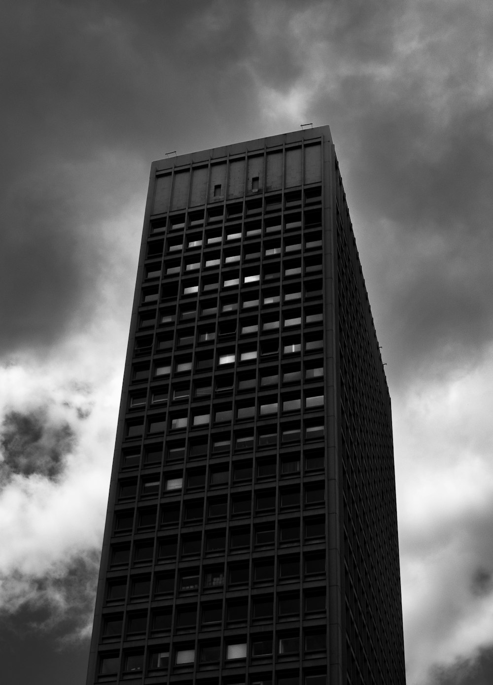 a black and white photo of a tall building