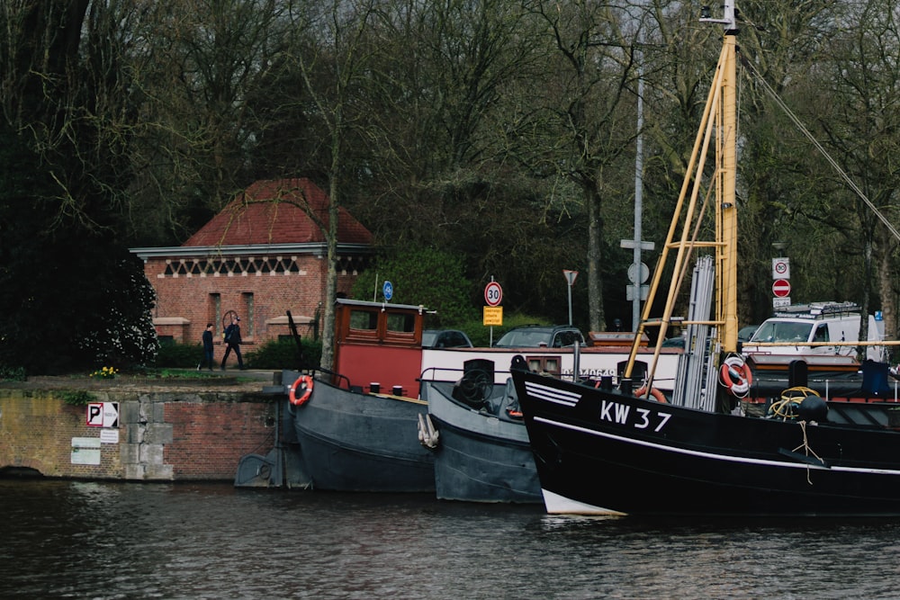 a couple of boats that are sitting in the water