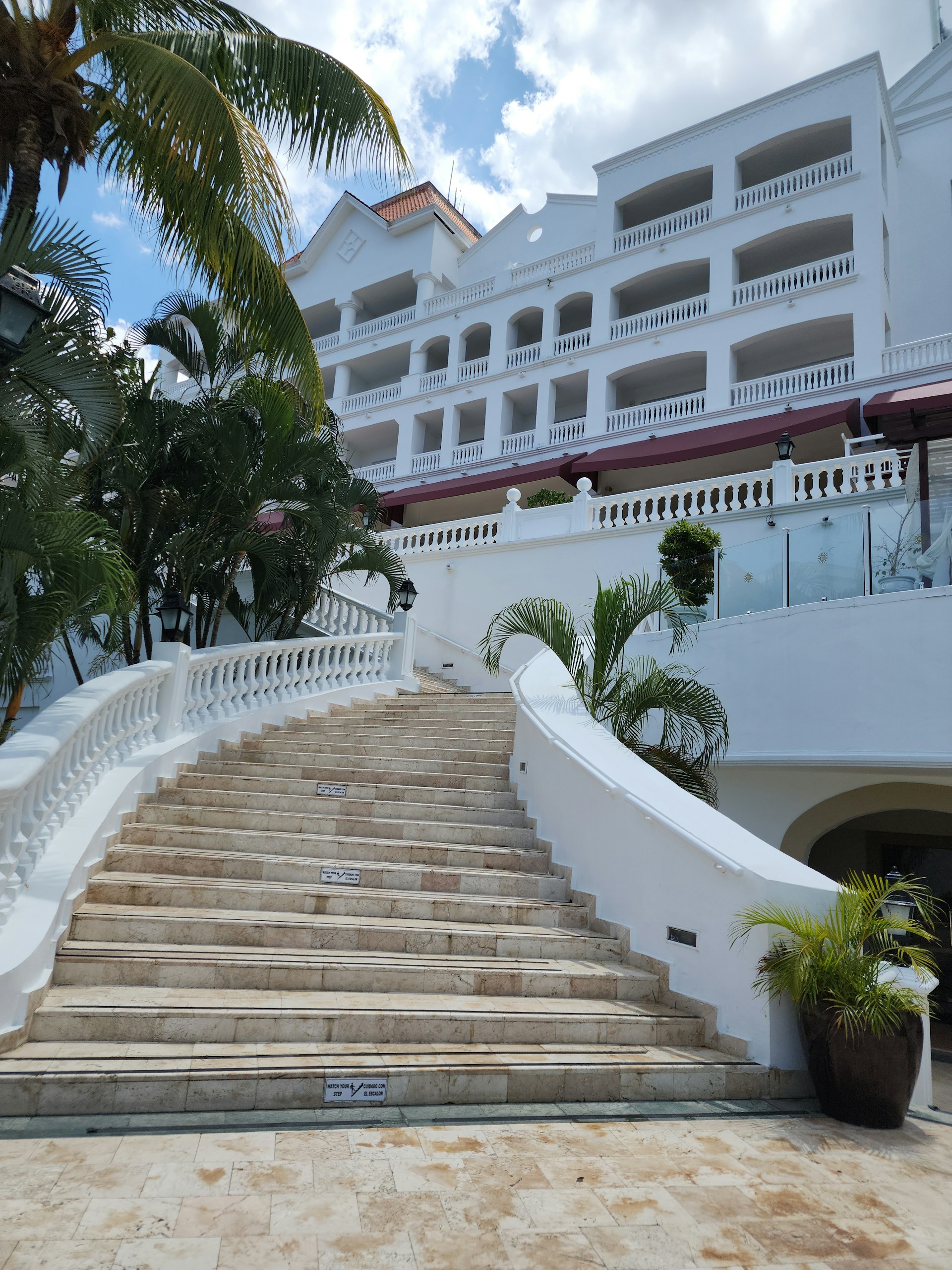 a set of stairs leading up to a hotel