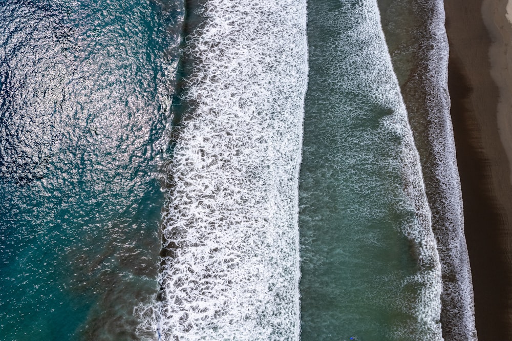 an aerial view of a beach and ocean