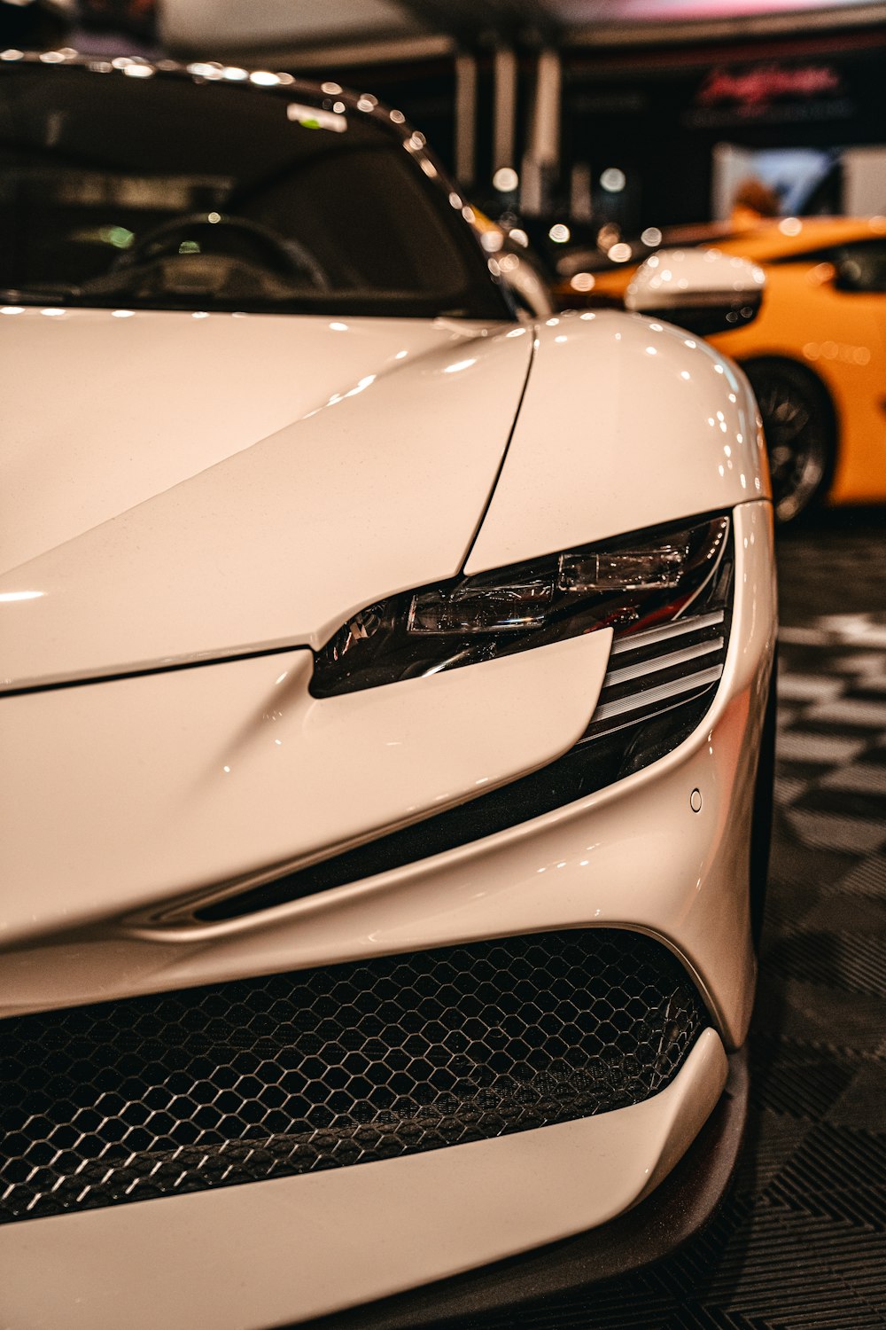 a close up of a white sports car