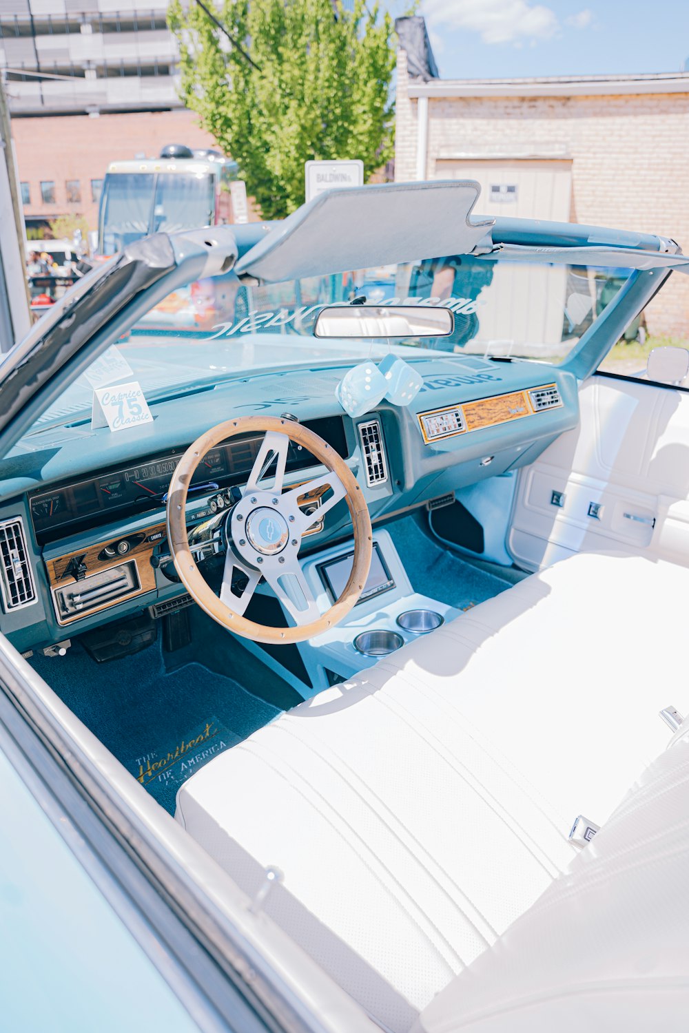 the interior of a car with a steering wheel