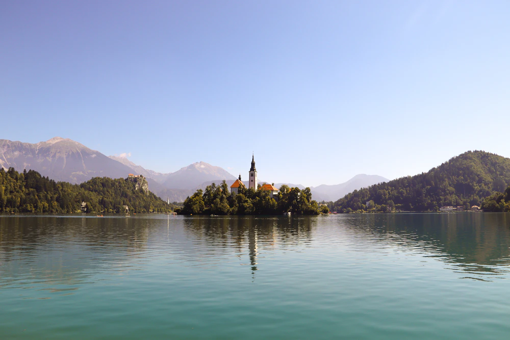 Lake Bled island church and Julian Alps