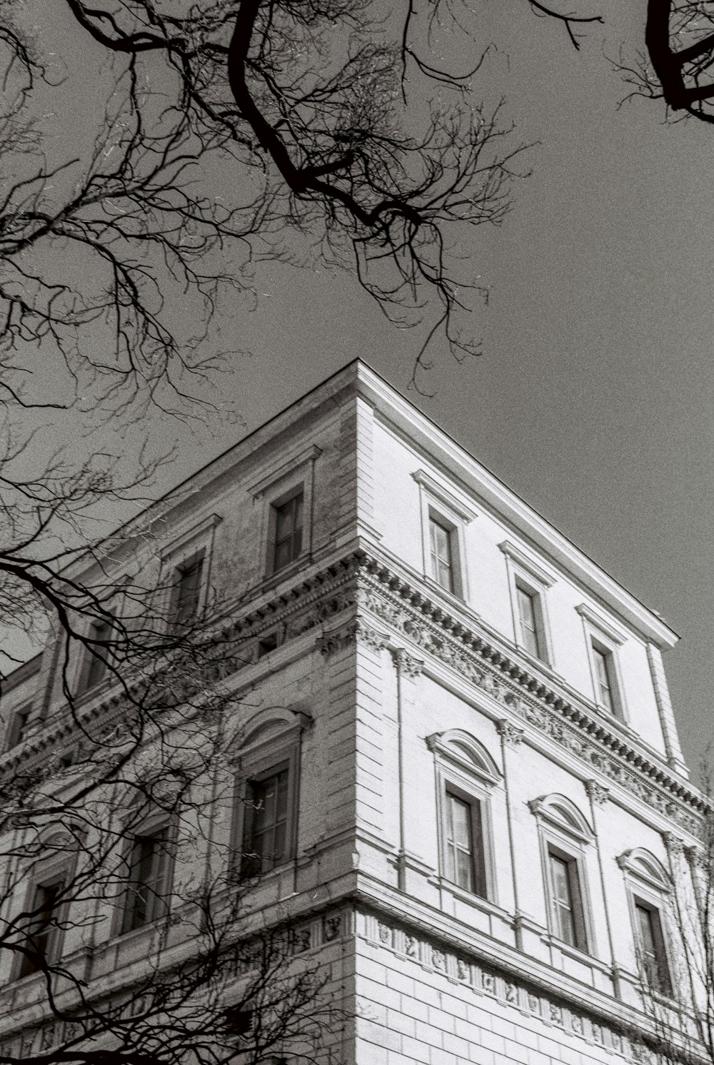 a black and white photo of a tall building