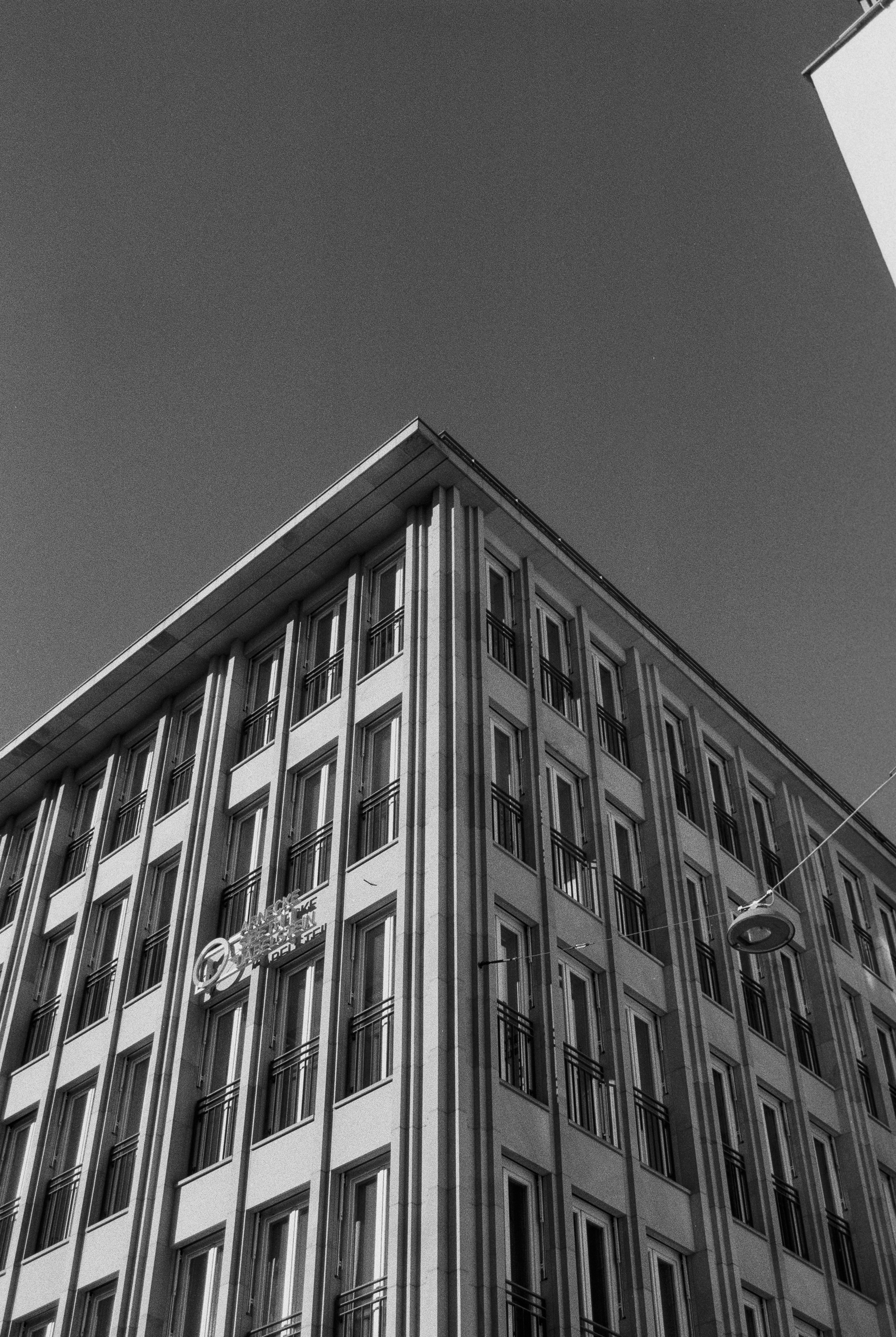 a black and white photo of a tall building
