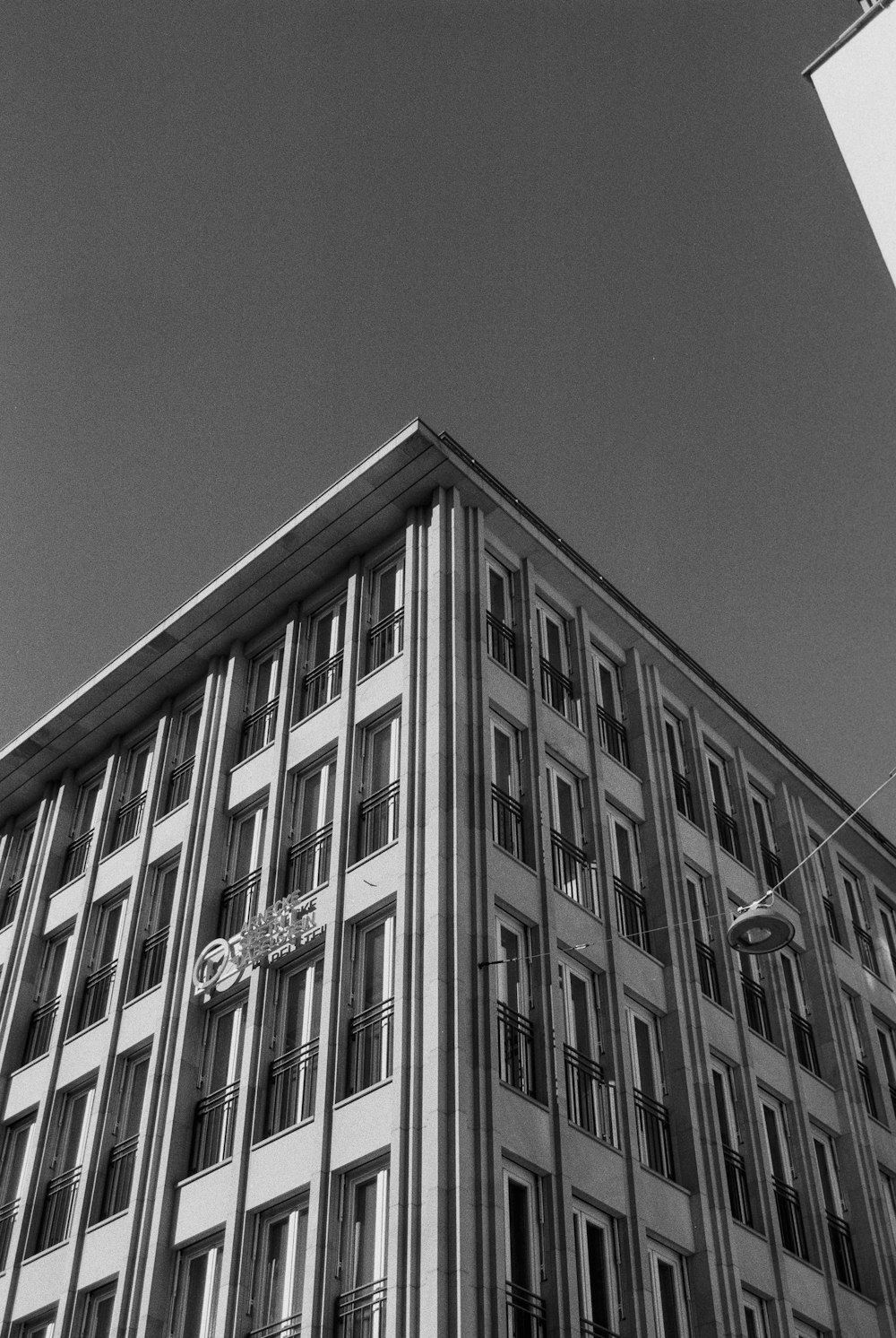 a black and white photo of a tall building