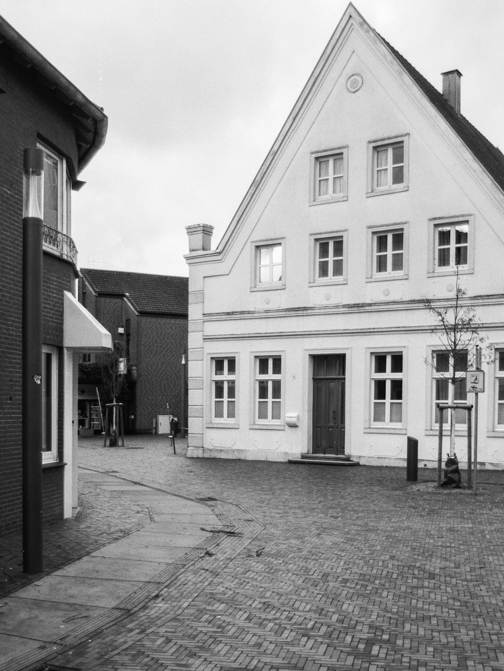 a black and white photo of a house