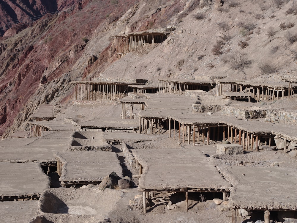 a group of buildings built into the side of a mountain