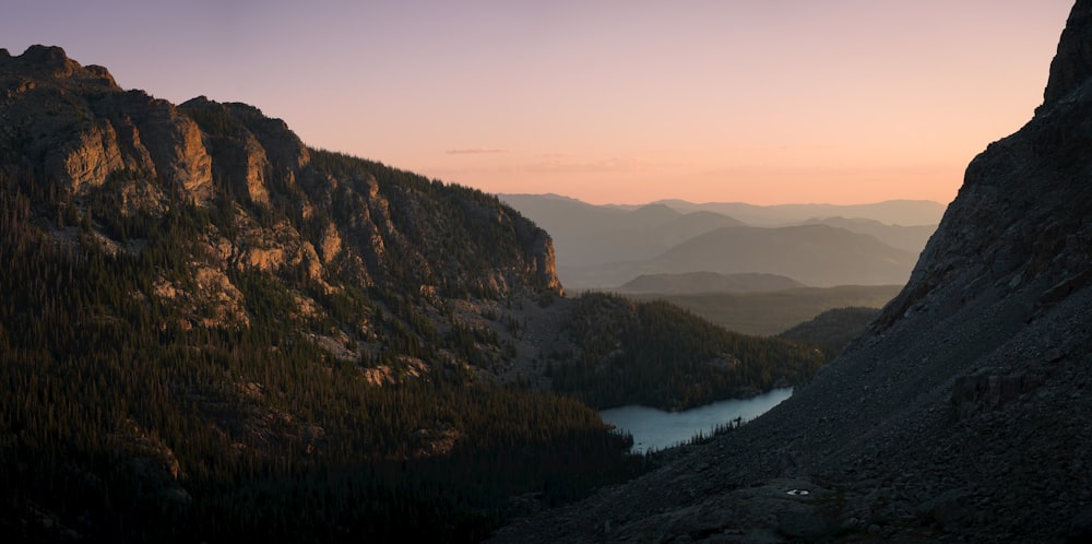 a mountain with a lake in the middle of it