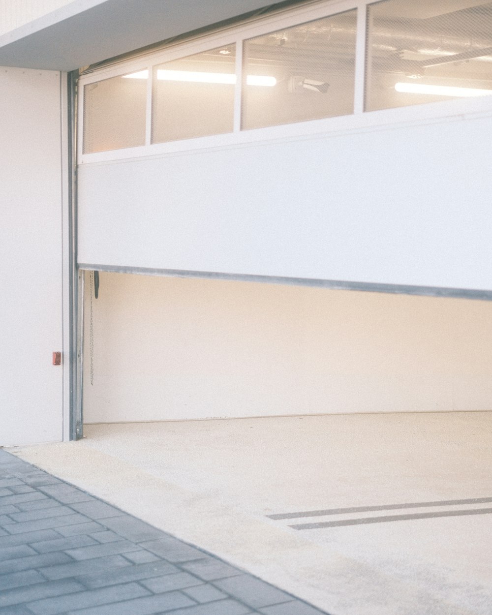 a man riding a skateboard into a garage