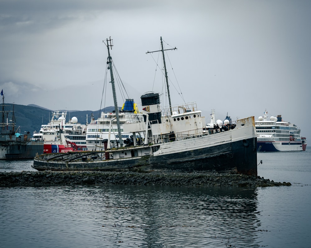 a large boat sitting on top of a body of water