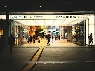 a group of people standing outside of a building