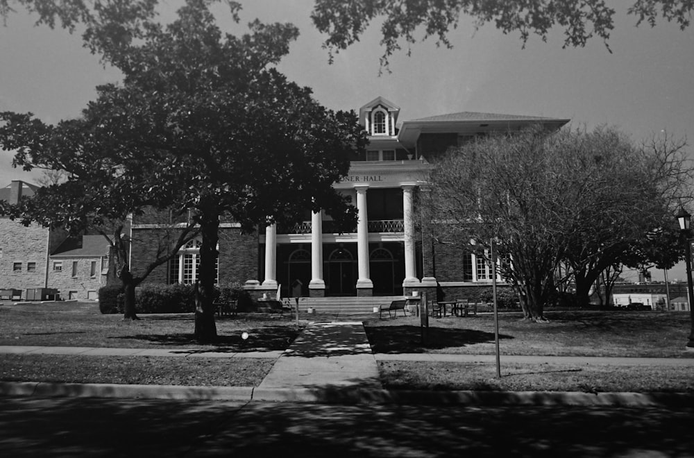 a black and white photo of a large building