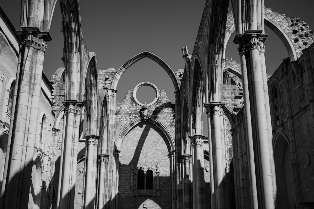 a black and white photo of an old cathedral