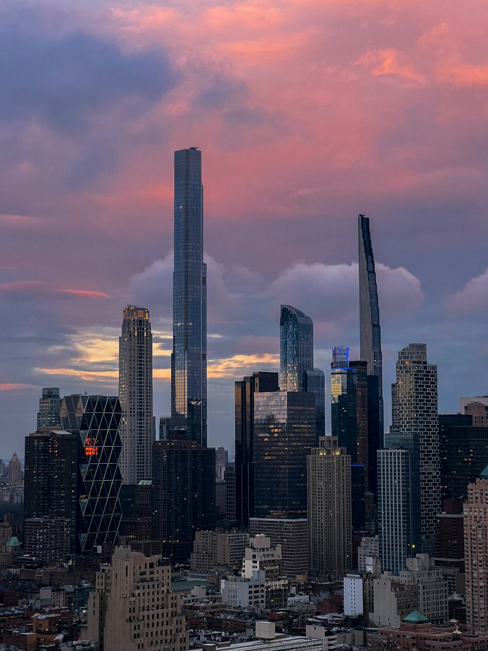 a view of a city with tall buildings