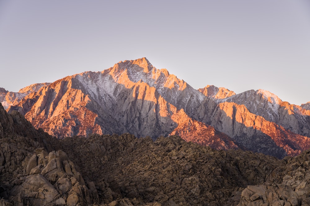 a view of a mountain range at sunset