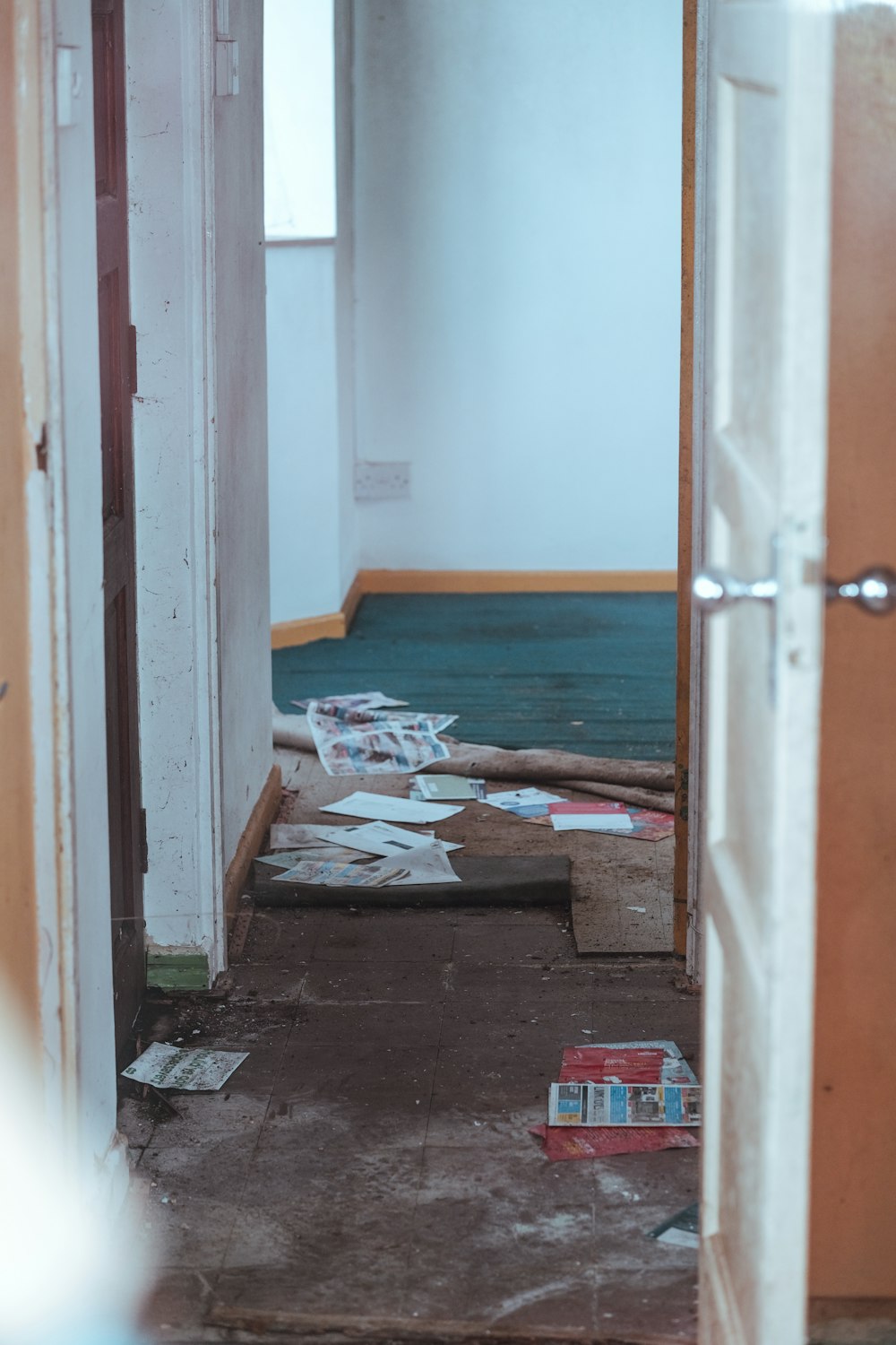 a room with a bunch of papers on the floor