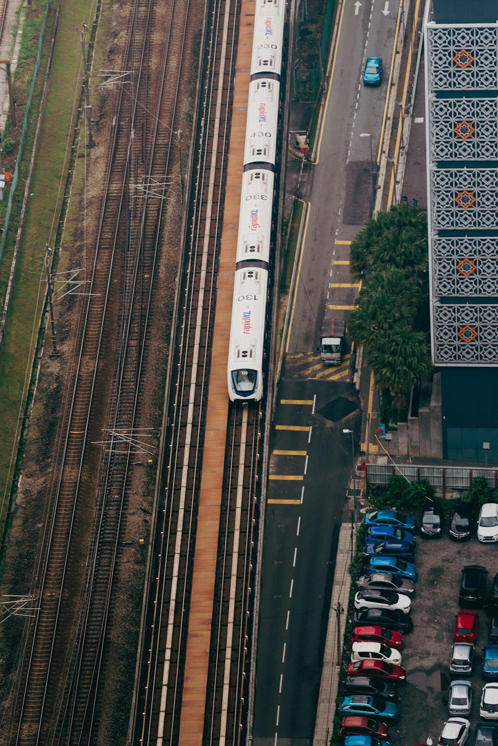 an aerial view of a train on the tracks
