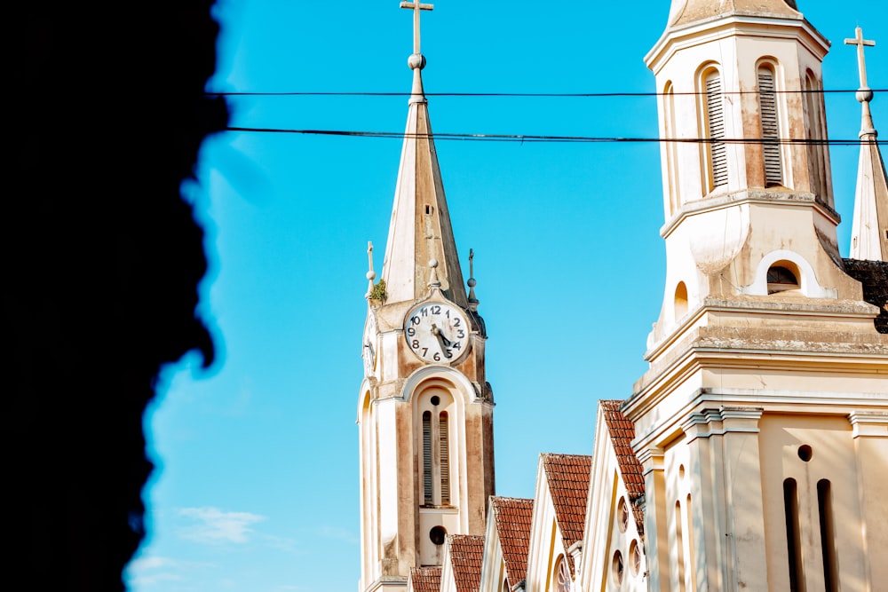 a church with a clock on the front of it