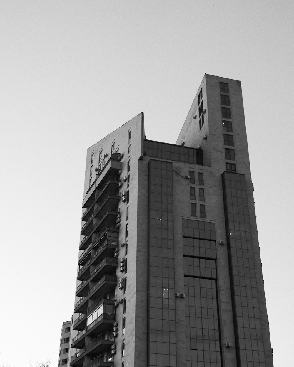 a black and white photo of a tall building