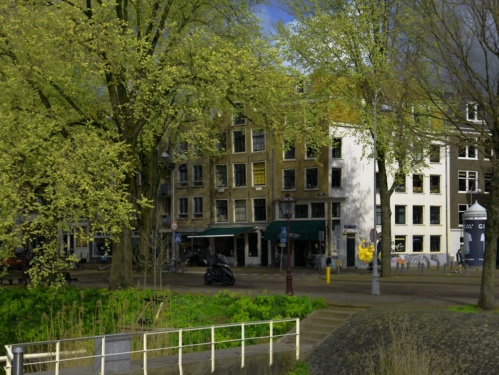 a street scene with a building in the background