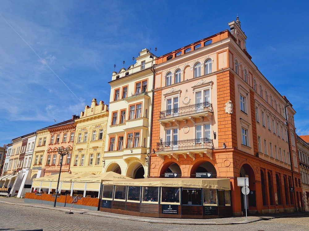 a row of buildings on a city street