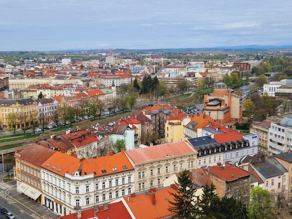 an aerial view of a city with many buildings