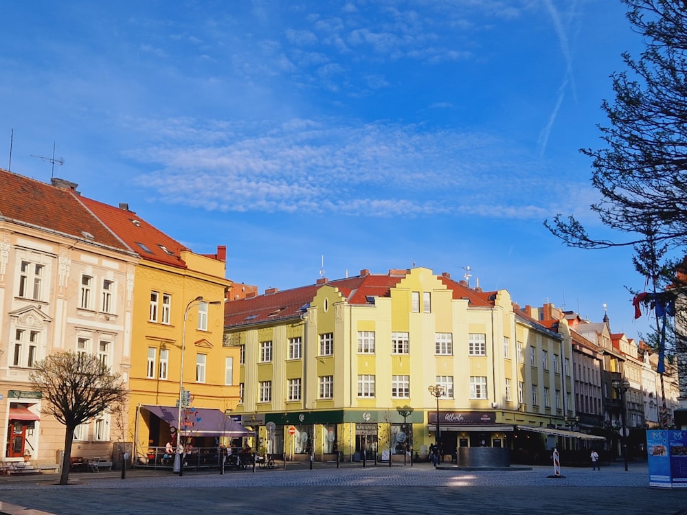 a row of buildings on a city street