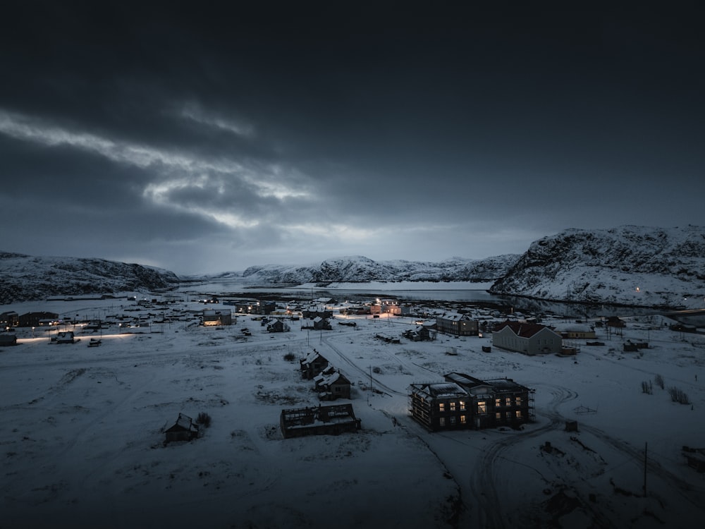 a small town in the middle of a snowy field