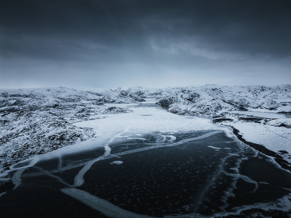 a river running through a snow covered landscape