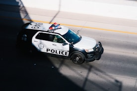 a police car parked on the side of the road