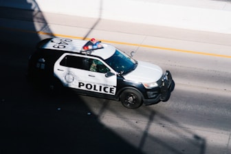 a police car parked on the side of the road