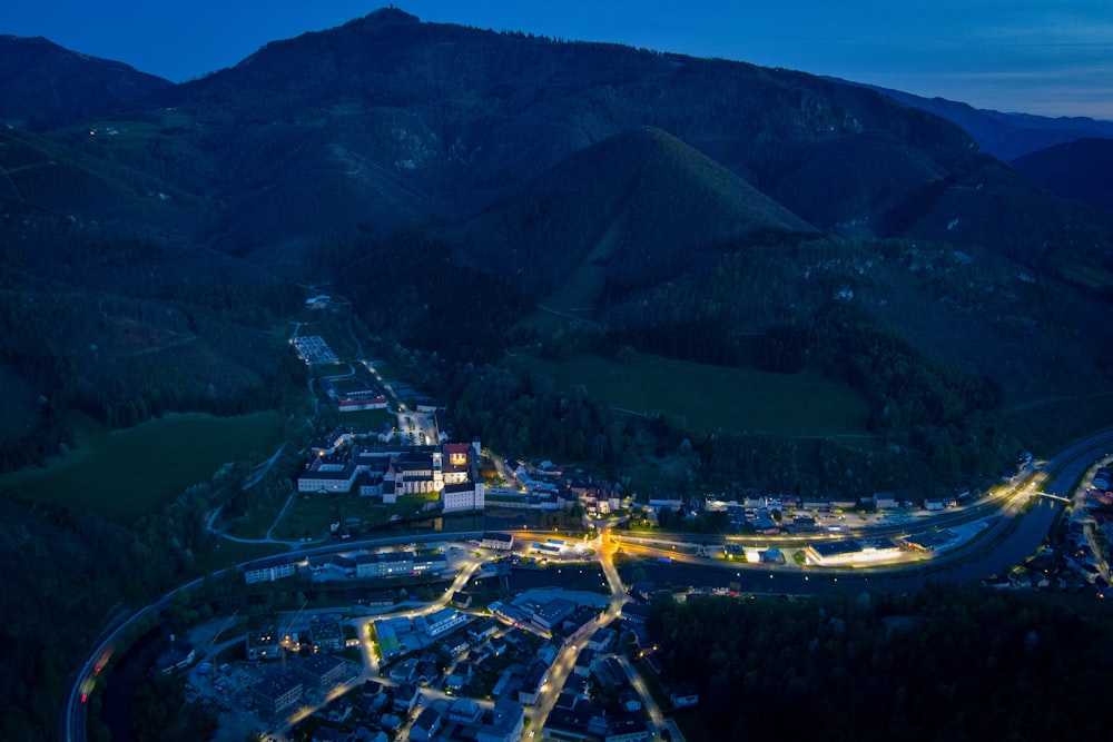 an aerial view of a city at night