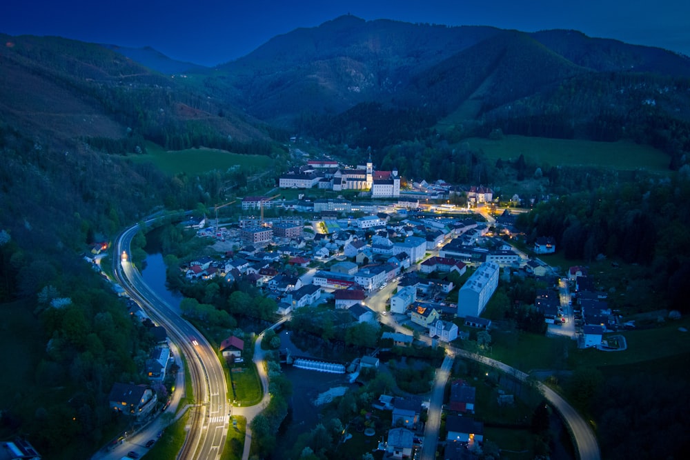 an aerial view of a town at night