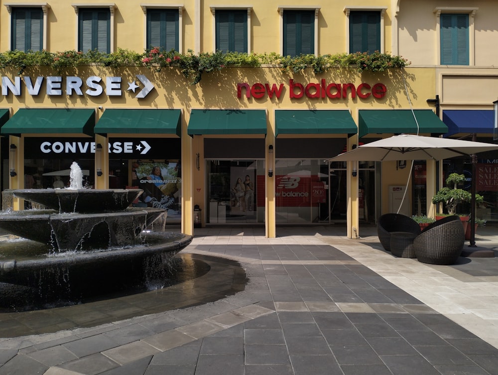 a building with a fountain in front of it