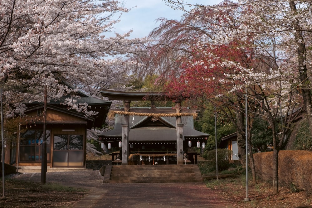 a small pagoda in the middle of a park