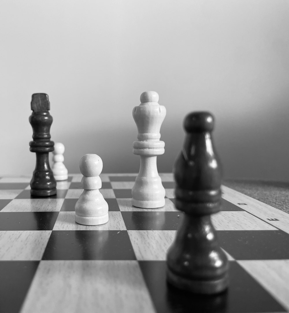 a black and white photo of a chess board