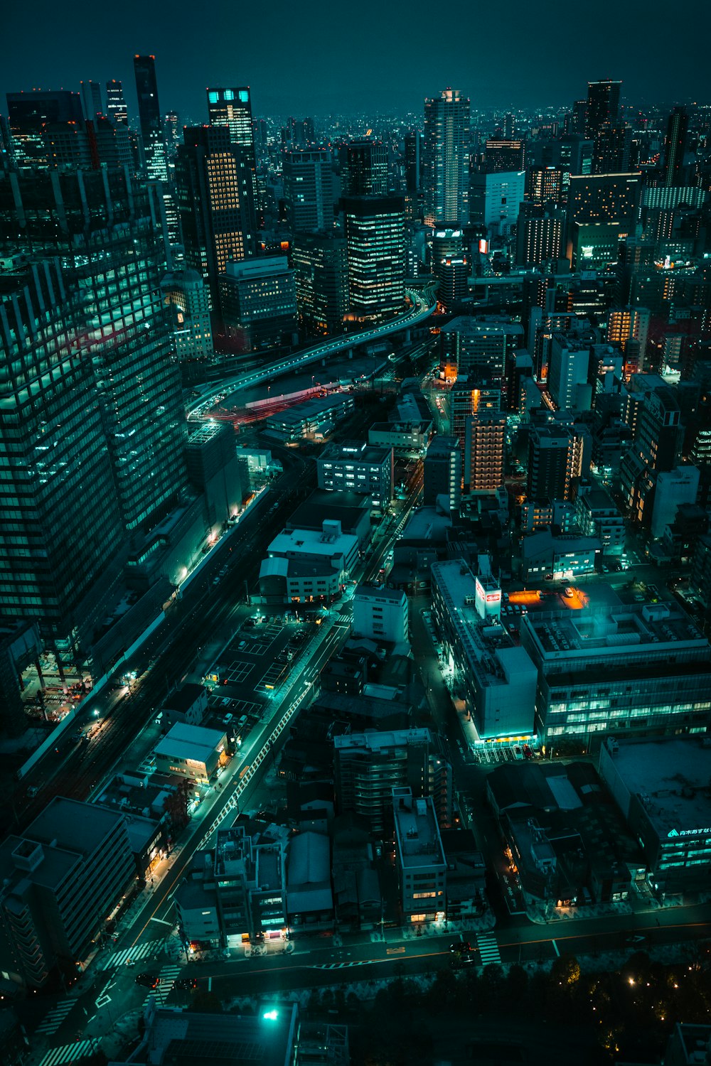 an aerial view of a city at night