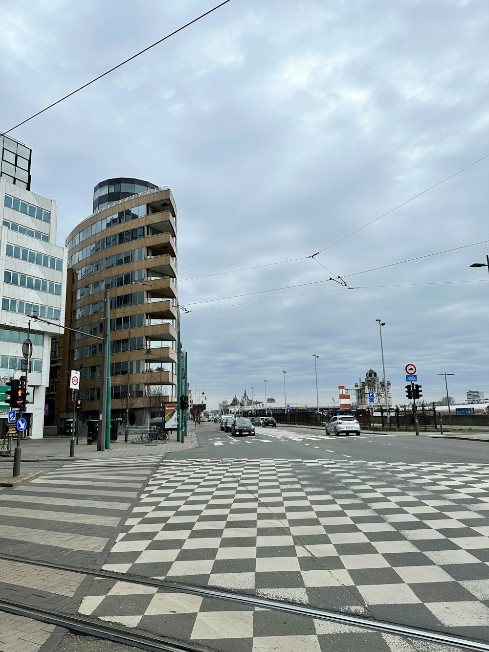 a street with a checkerboard pattern in the middle of it