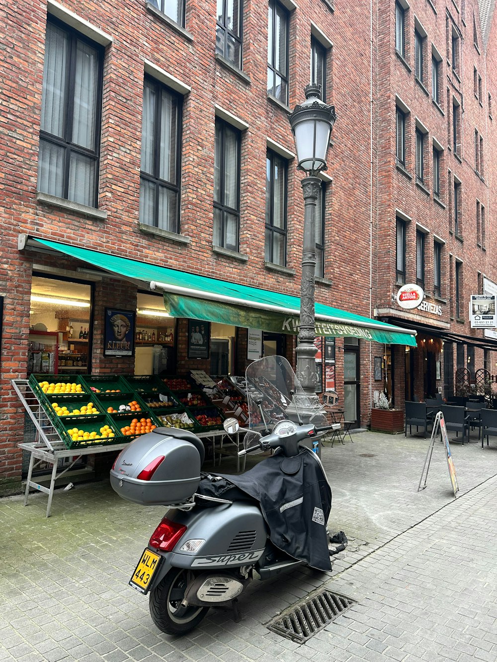 a motorcycle parked in front of a store