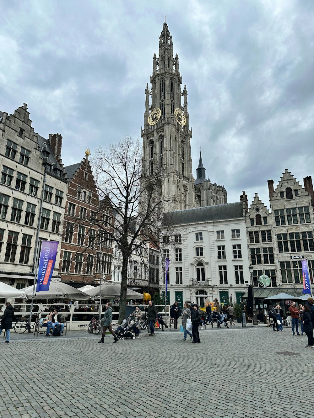 a large clock tower towering over a city