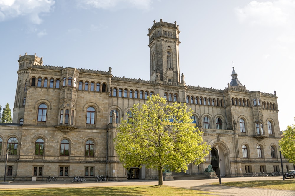 a large stone building with a clock tower