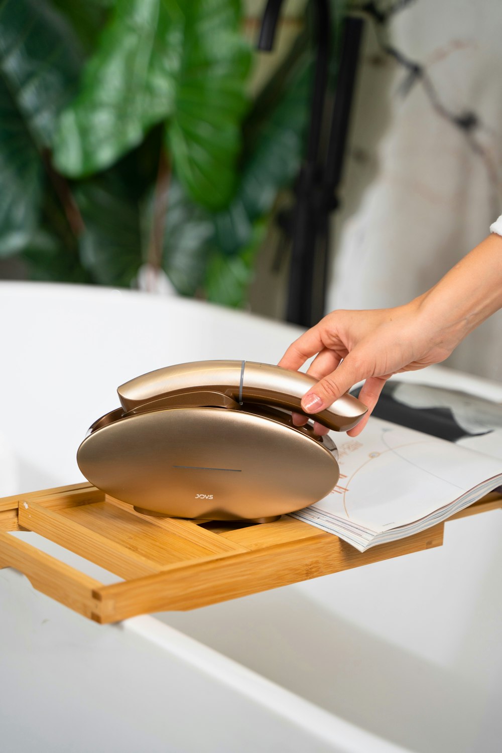 a person using a computer mouse on top of a desk