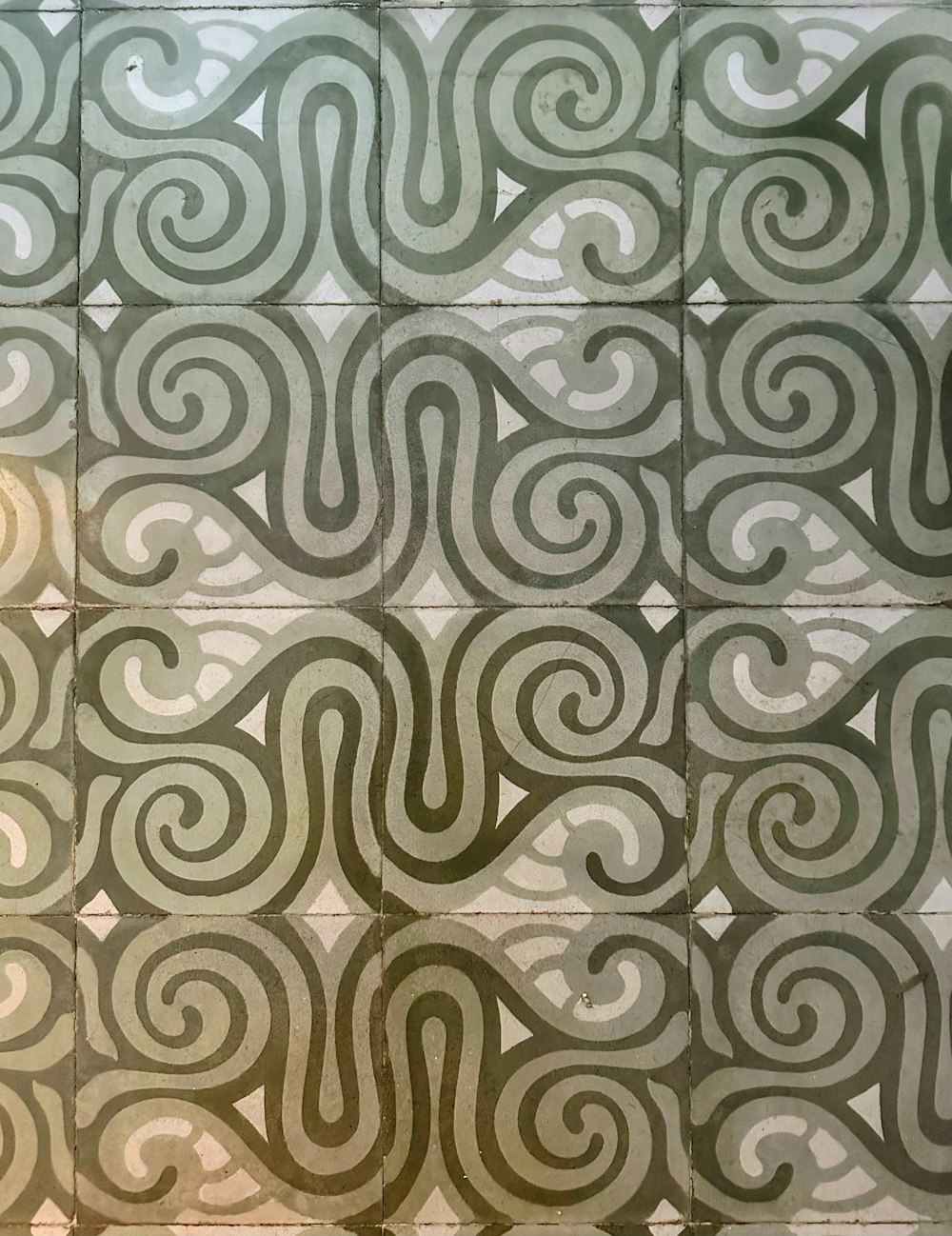 a close up of a wall with a pattern on it