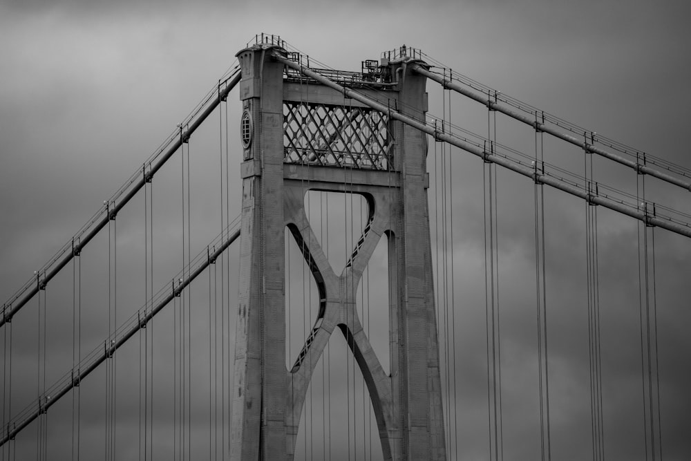 a black and white photo of the top of a bridge