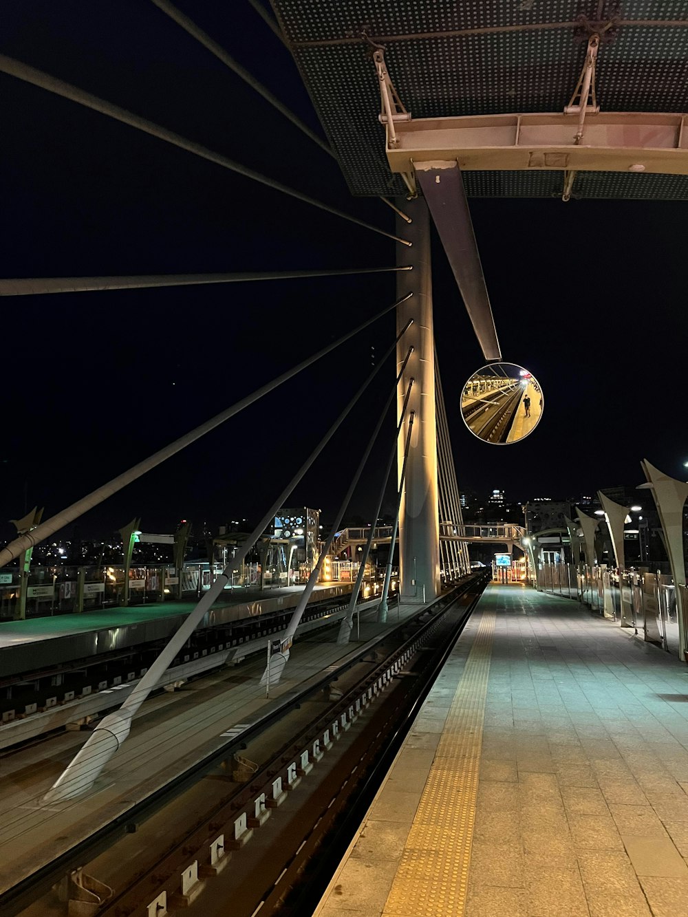 a view of a train station at night