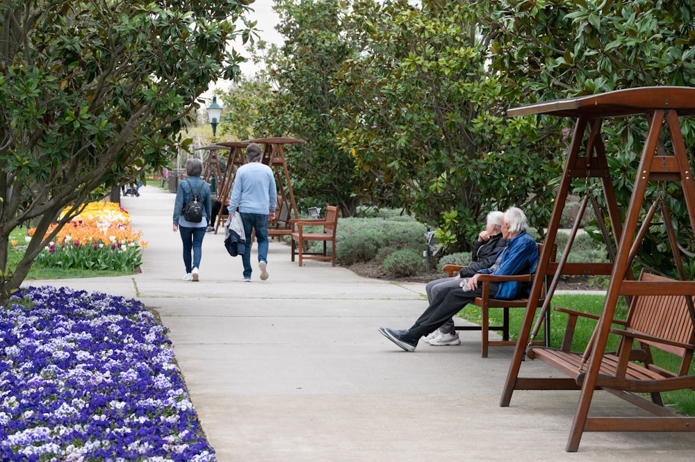 a couple of people that are sitting on a bench