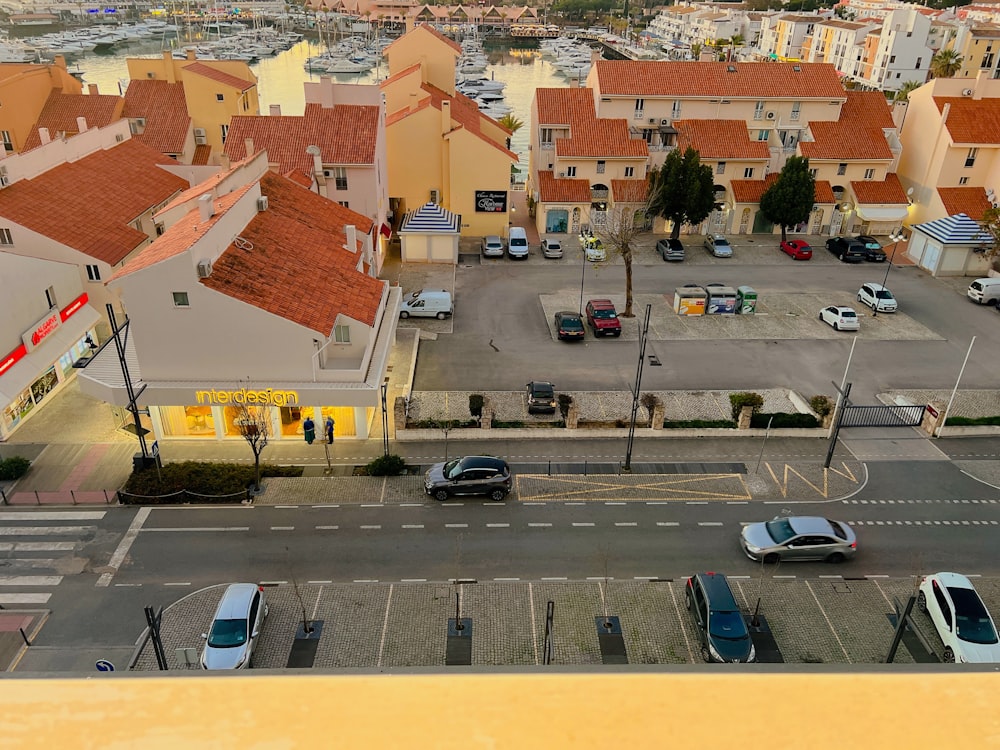 a view of a parking lot with cars parked in it