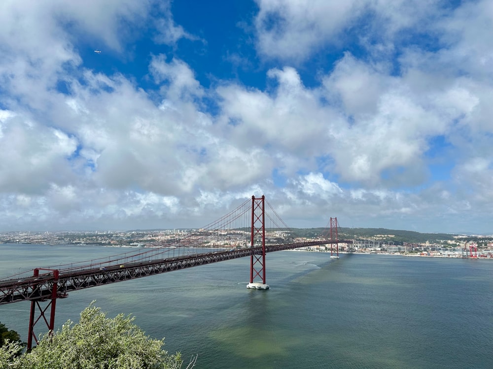 a view of the golden gate bridge from the top of a hill